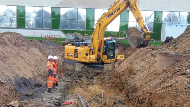 Ouvriers sur chantier d'assainissement